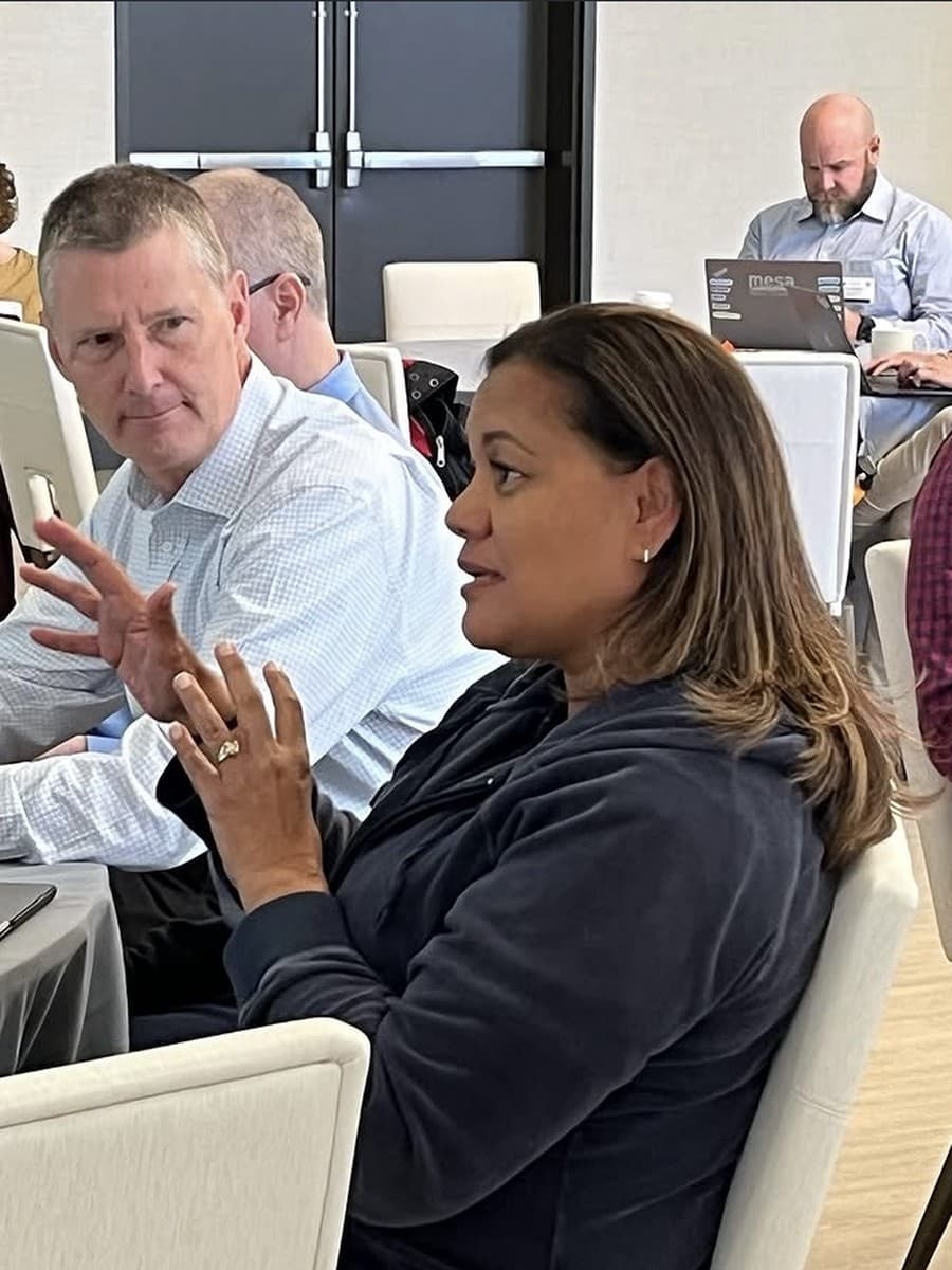 A participant speaking during a Mastery.org higher-ed session